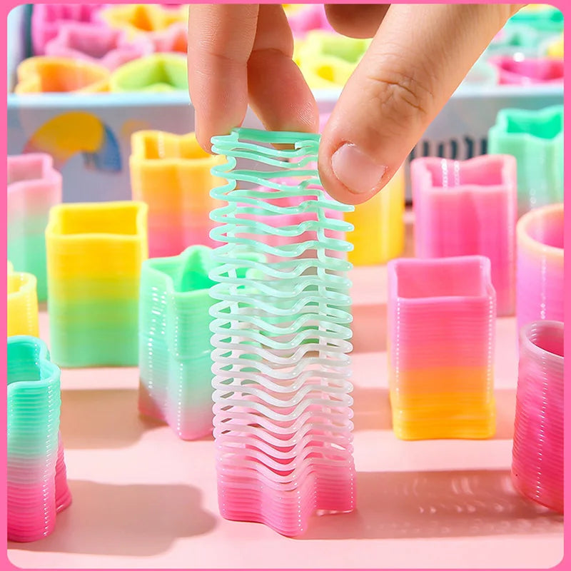 Rainbow Magic Springs Circle Toy for Kids Flexible Fun Birthday Party Favor Small Gift Pinata Fillers Ideal for Guest Giveaway